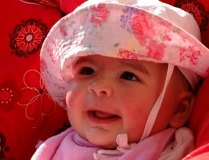 baby's white pink floral hat thumbnail