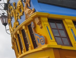 yellow and blue concrete building thumbnail