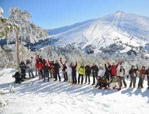group of person on a white snow thumbnail
