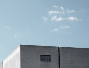 gray concrete building and sky thumbnail