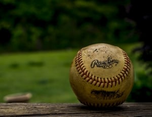 close up photo of a white rawling baseball thumbnail