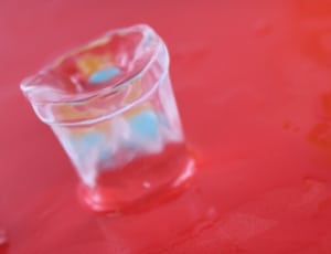 ice melting on red surface thumbnail