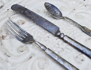 stainless steel fork, spoon and bread knife thumbnail