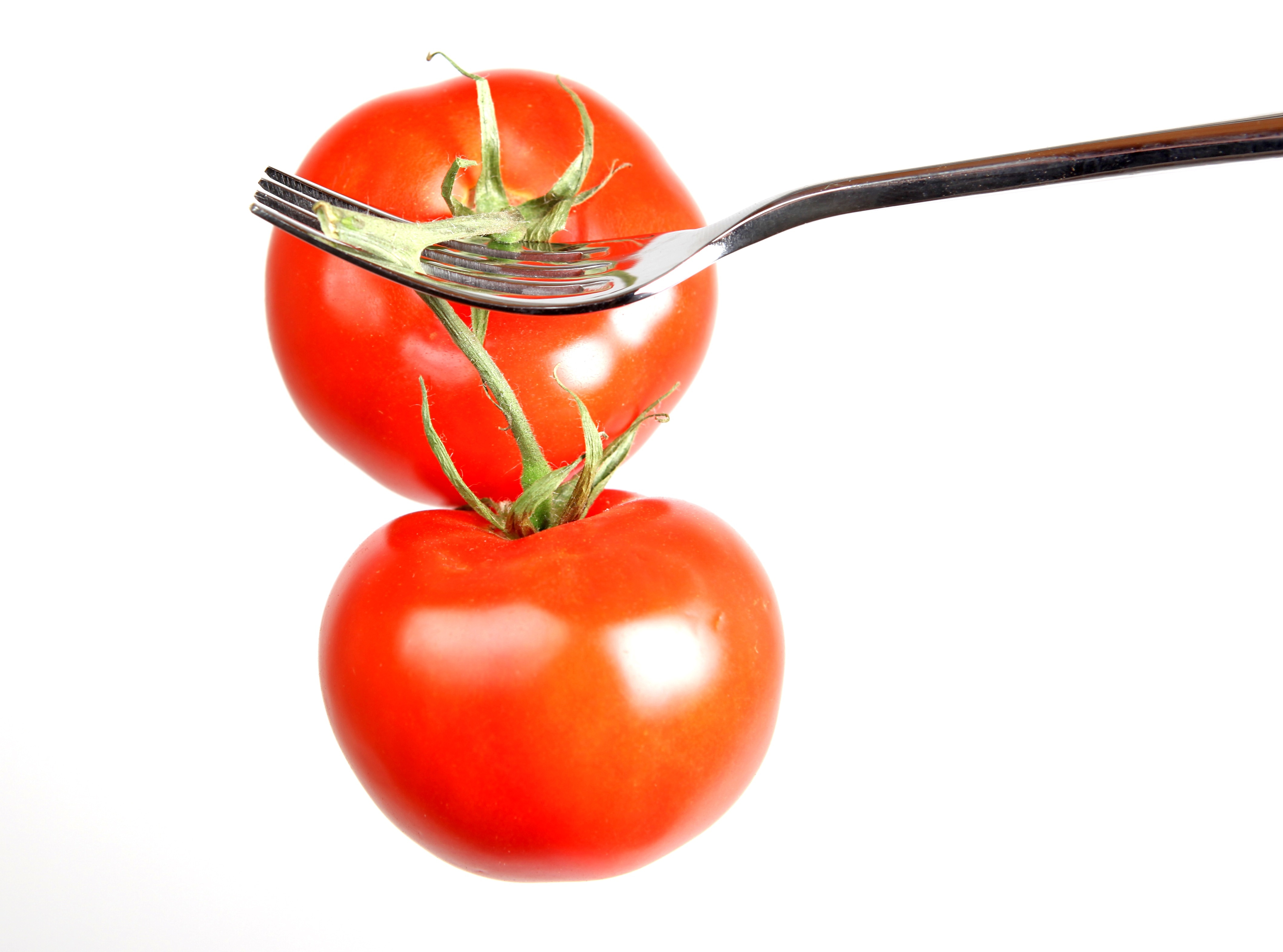 Two tomatoes. Помидор. Помидоры здоровая еда. Вилка для помидор. Помидор на вилочке.