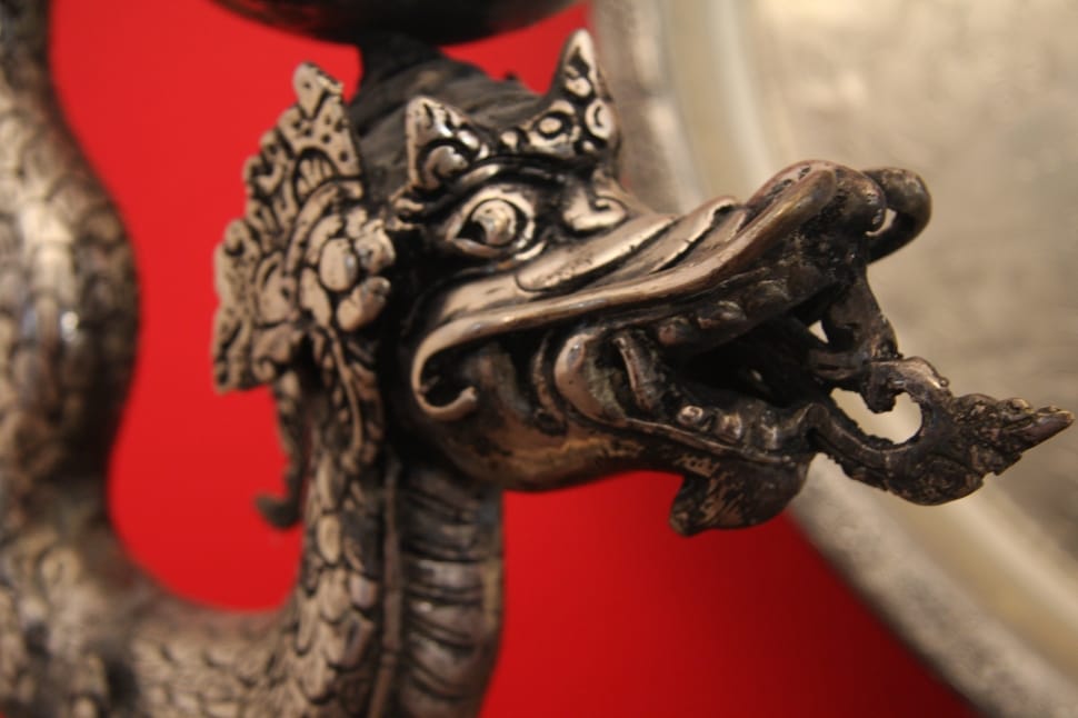 gray metal dragon figurine preview