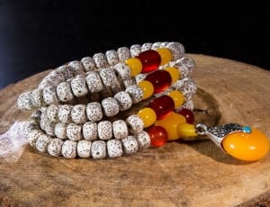 white yellow and red beaded bracelet thumbnail