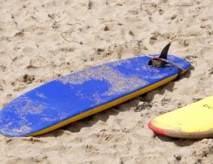 blue and yellow surfboard thumbnail