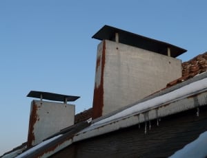 white concrete building roof vents thumbnail