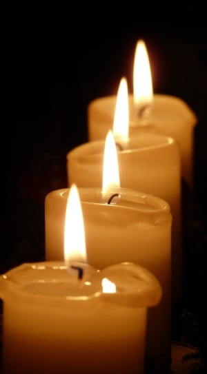 4 white candles thumbnail