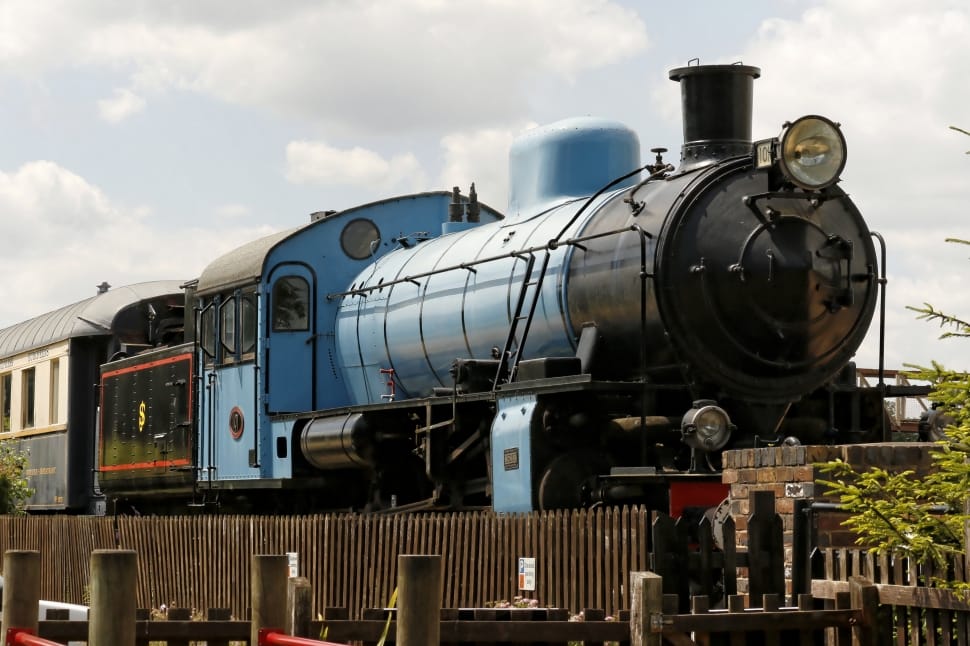 close up photo of blue and black parked train preview
