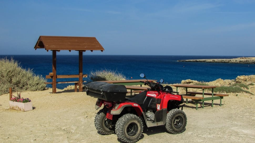 red and black atv with saddle box preview