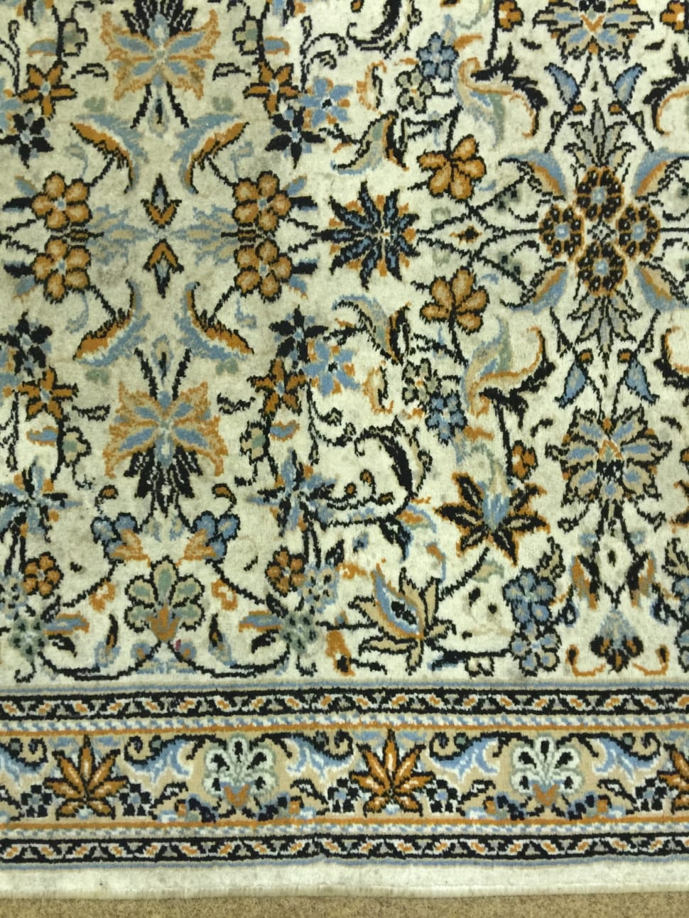 white brown and cyan floral area rug preview