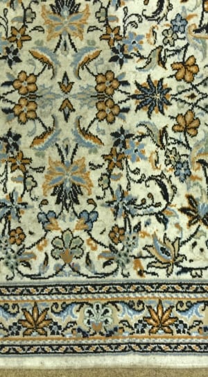 white brown and cyan floral area rug thumbnail