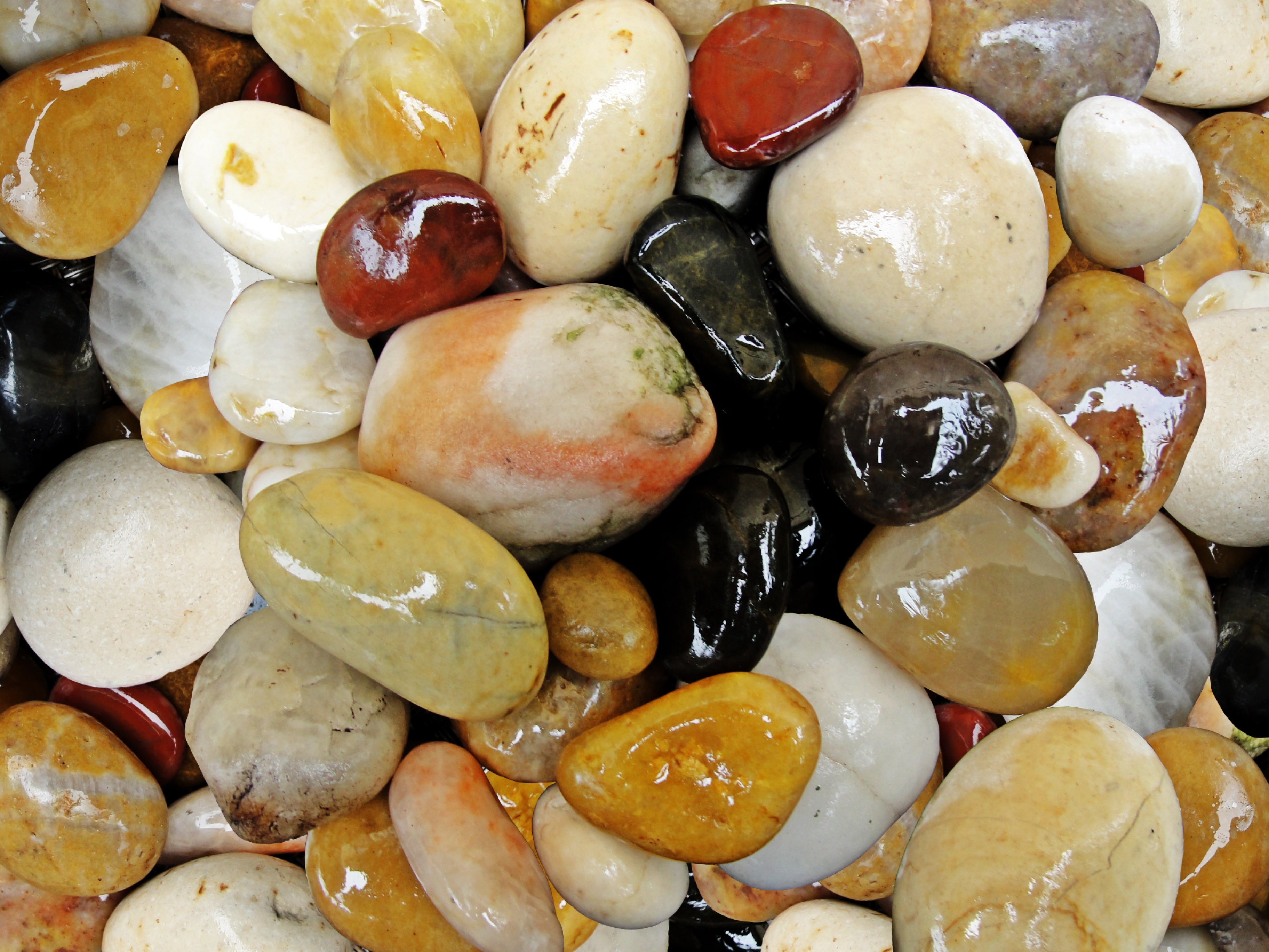 yellow black white brown and red pebbles