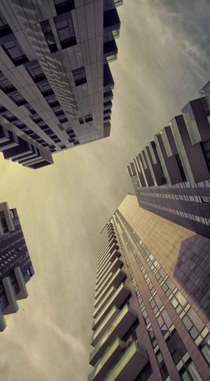 worm's eye view photography of high rise buildings thumbnail