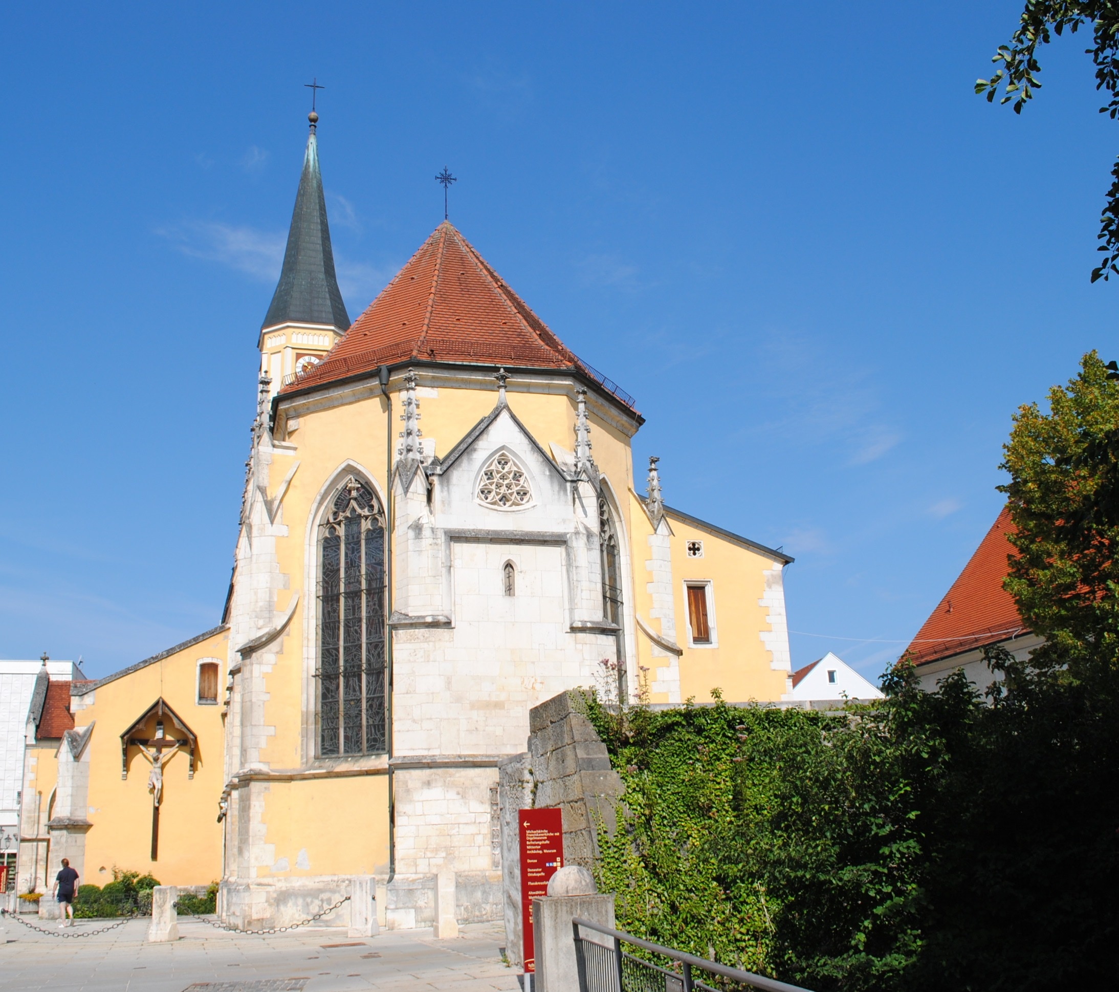 beige red and white painted church