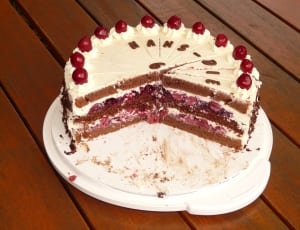 white brown and red round cake thumbnail