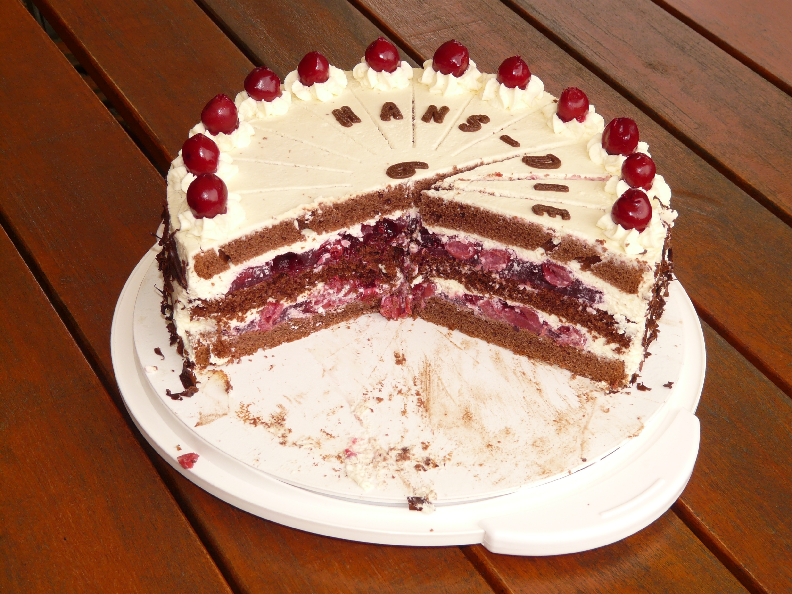 white brown and red round cake