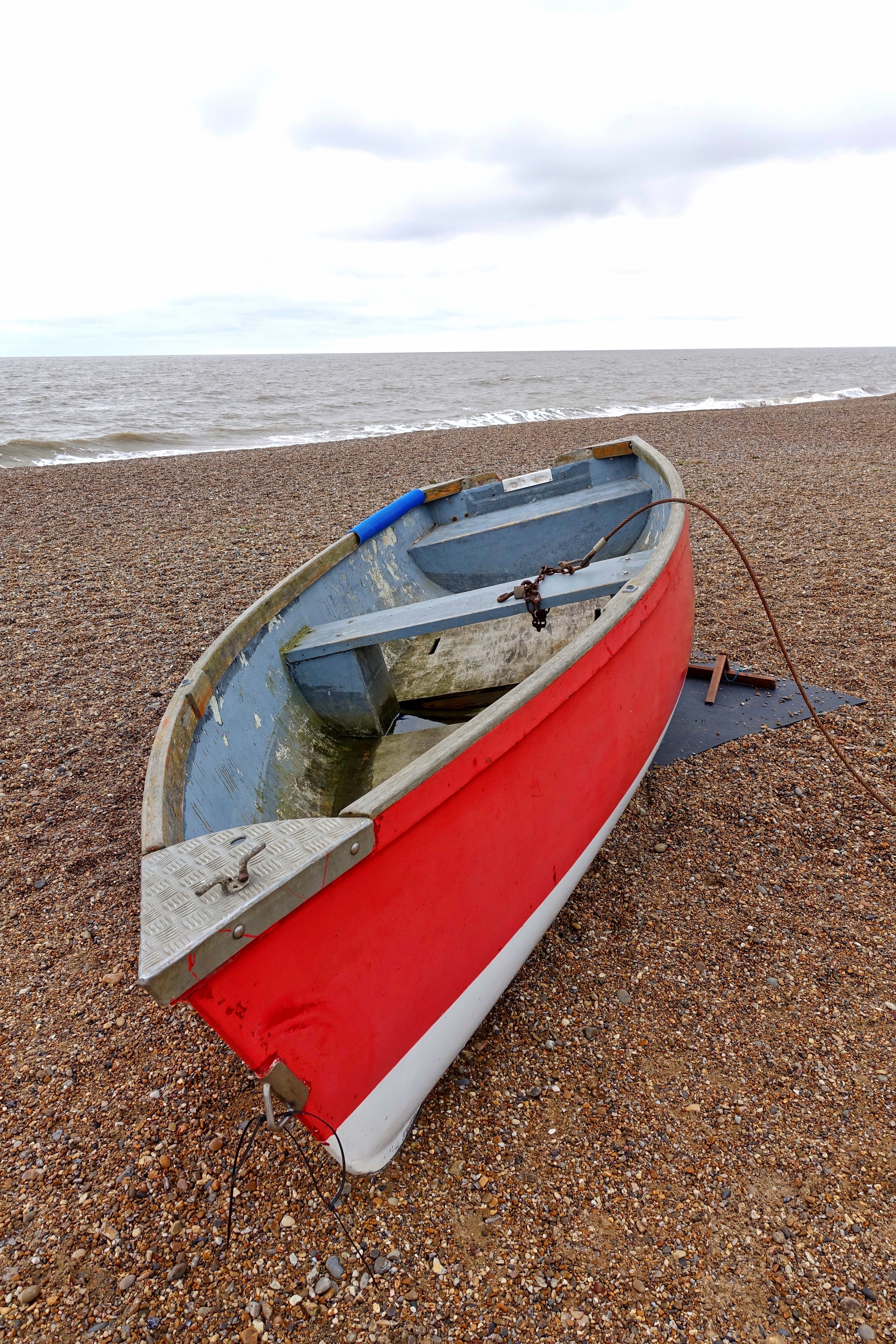 red and white canoe