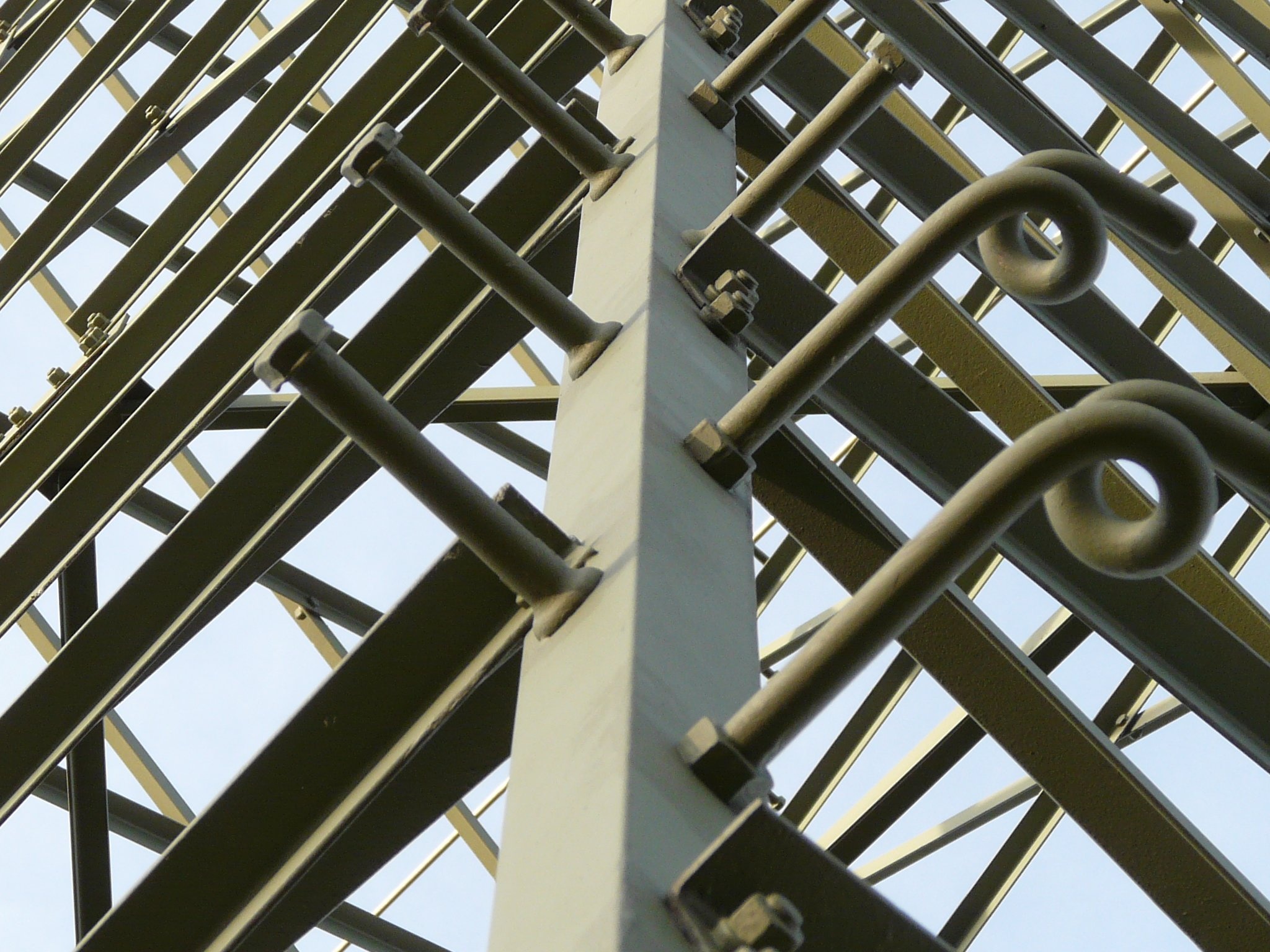 white and gold metal tower frame