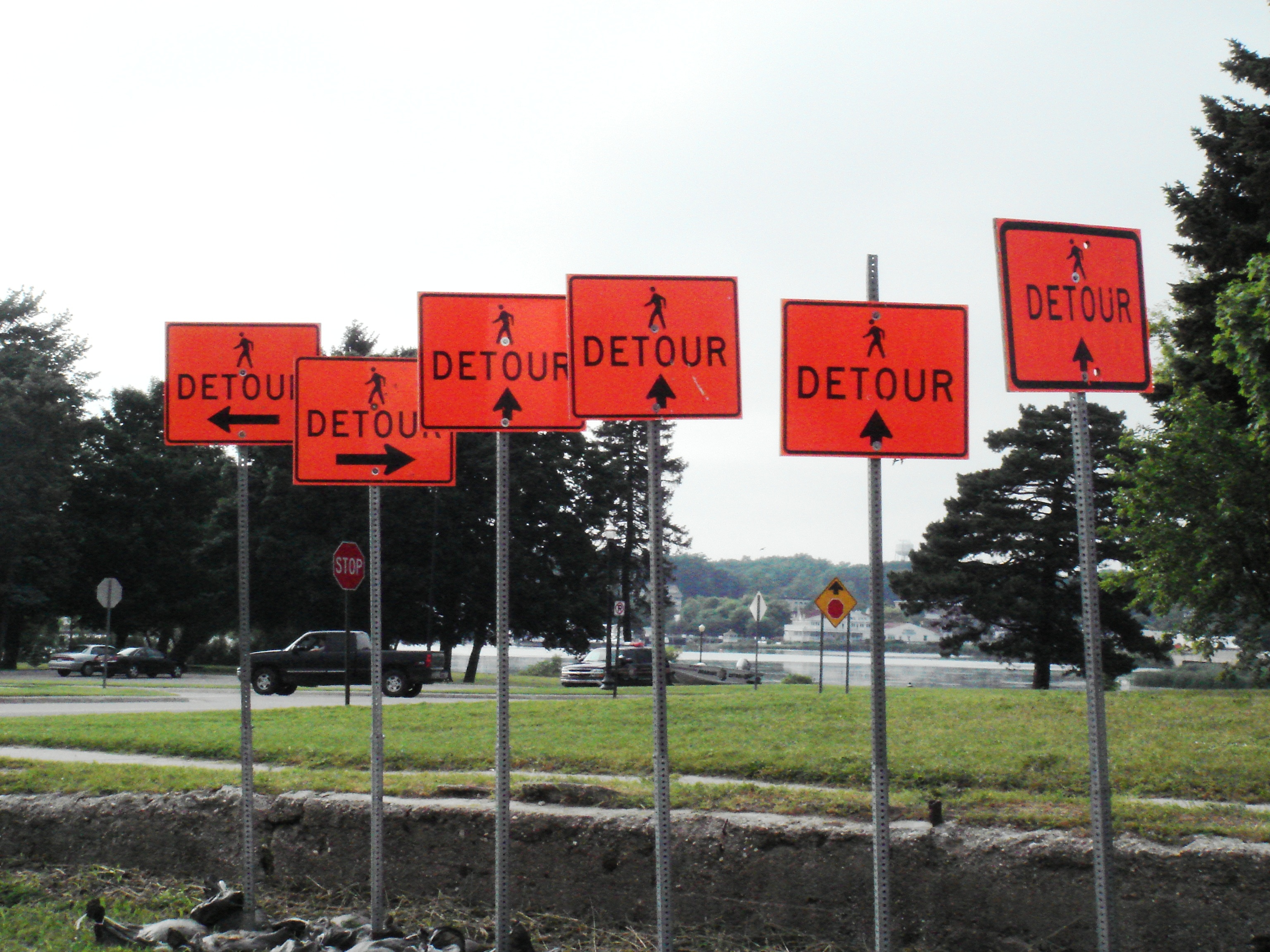 orange and black detour signage