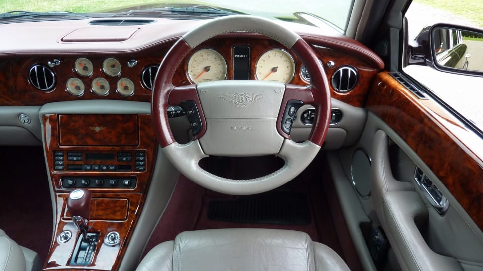 gray and brown car steering wheel preview