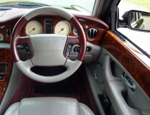 gray and brown car steering wheel thumbnail