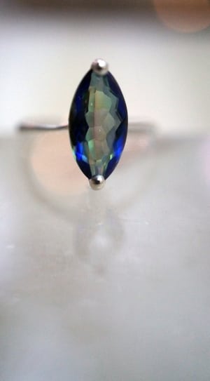 blue gemstone and silver ring thumbnail