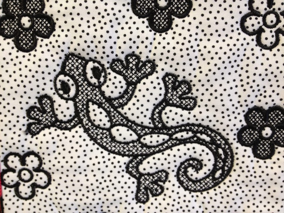 white and black lizard print textile preview