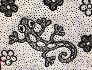 white and black lizard print textile thumbnail