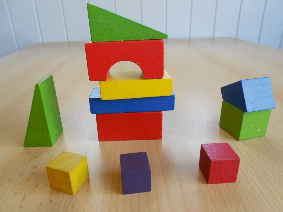 green blue red and yellow wooden cube preview