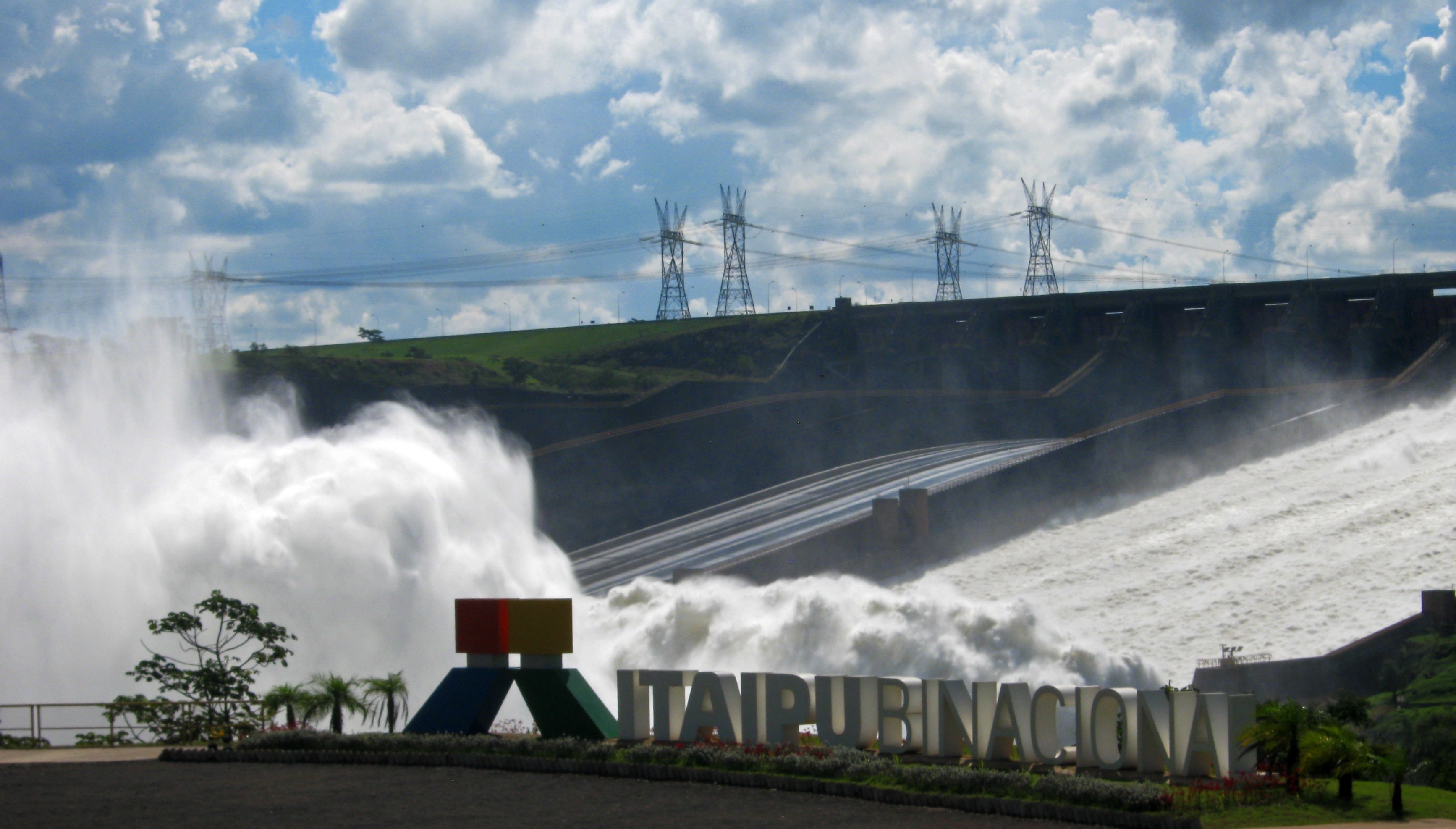 hydro power plant under blue sky and white clouds