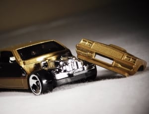 gold coupe die cast model thumbnail