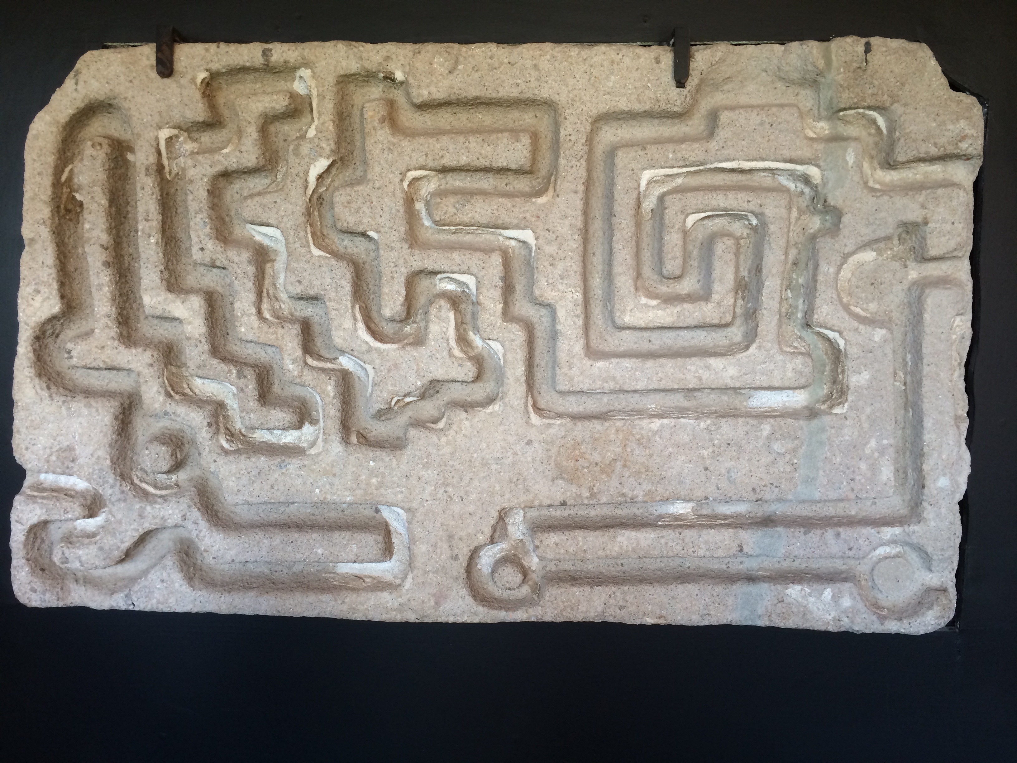 gray rectangular stone maze board