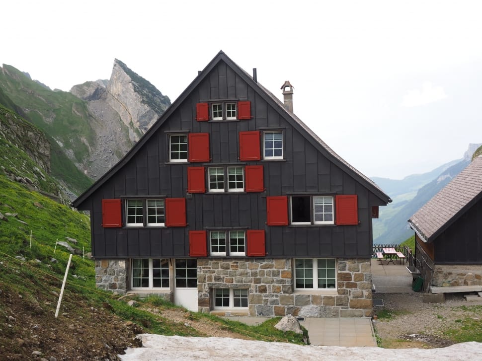 black and red wooden residential building preview