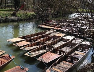 brown wooden canoe boat lot thumbnail