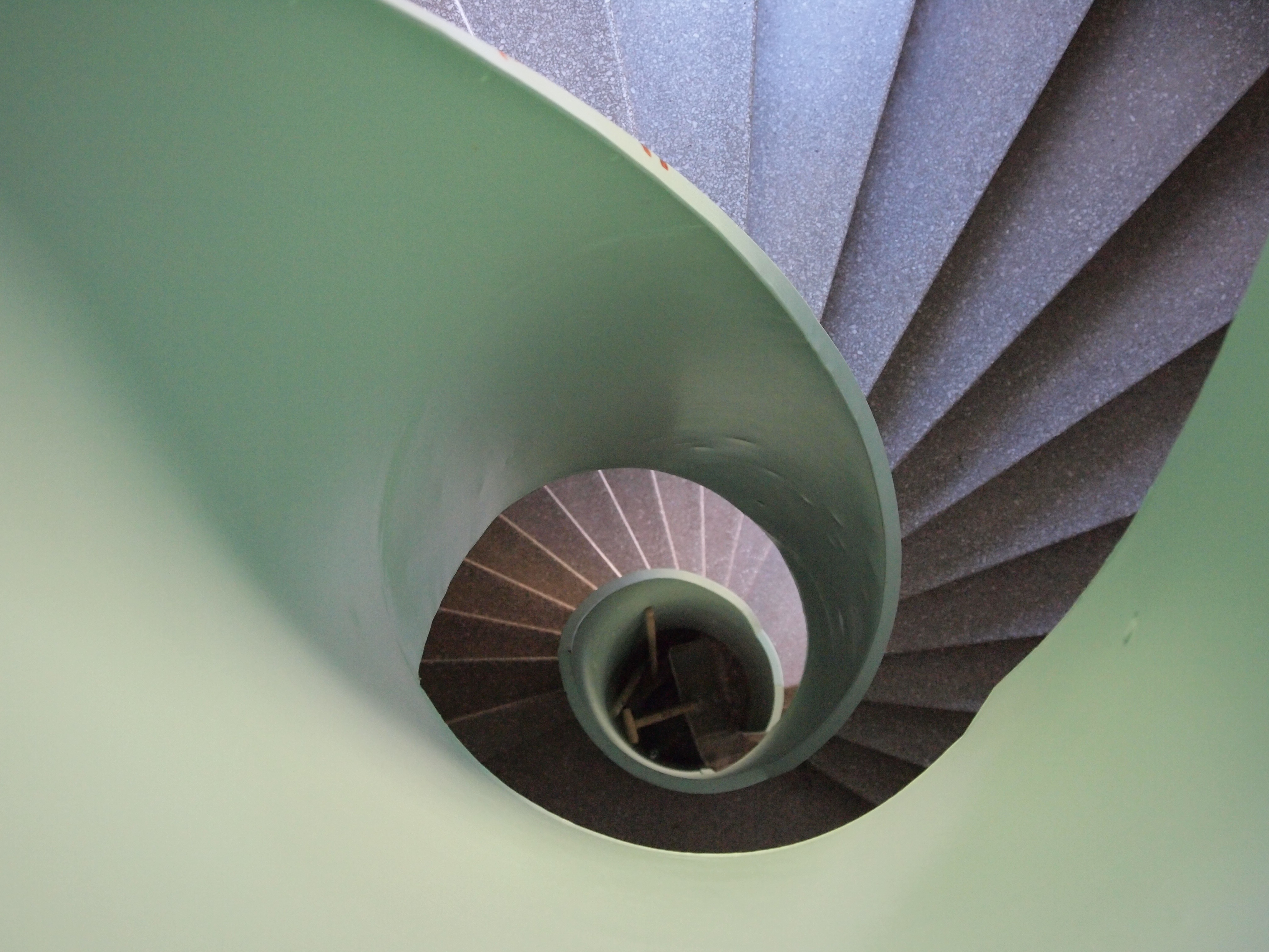 green and gray spiral stairs
