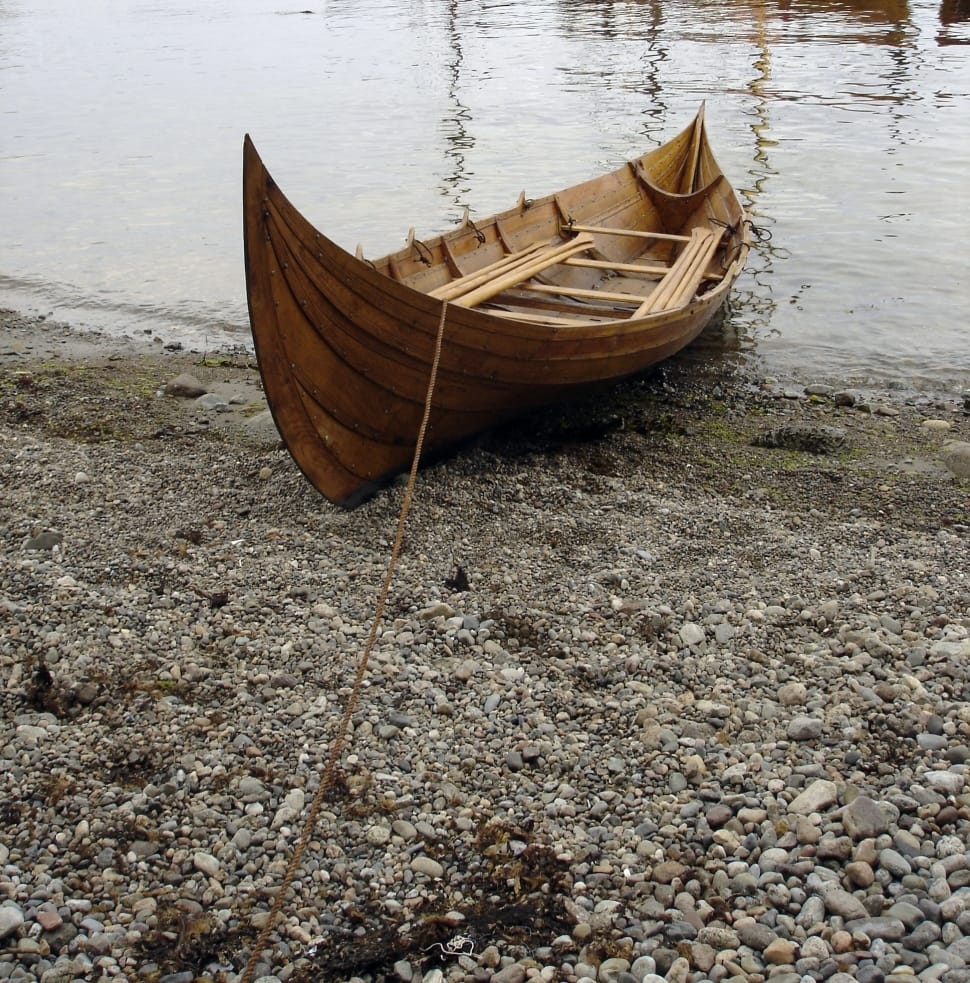brown wooden canoe preview