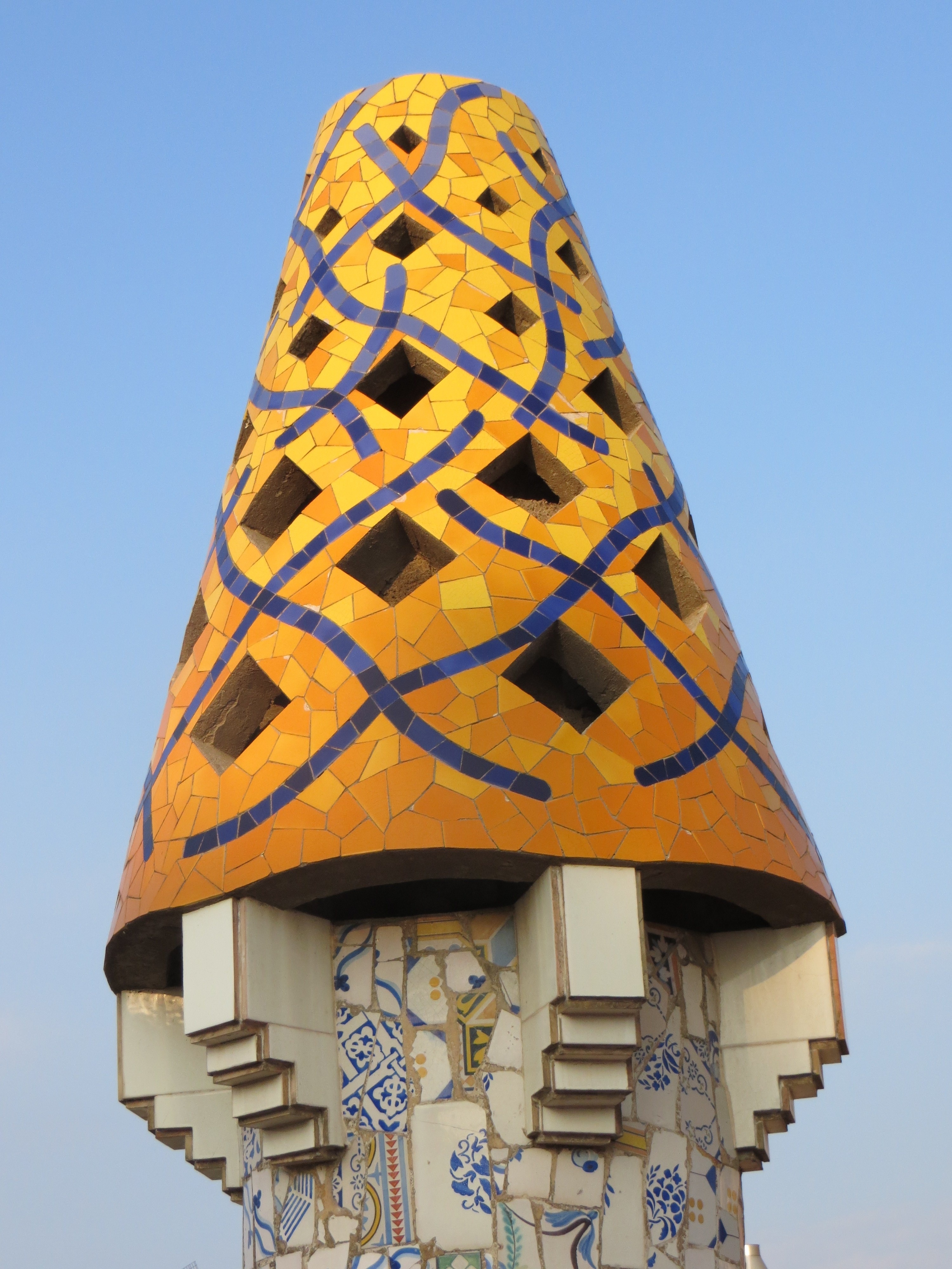 yellow and orange concrete tiled surface tower