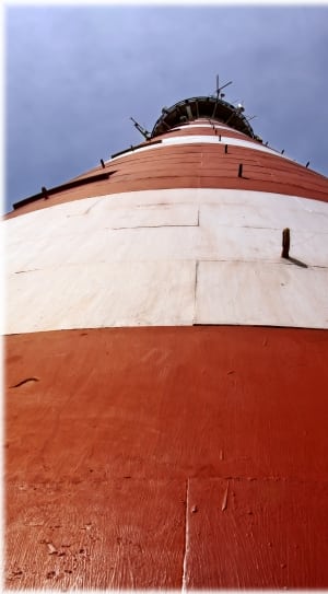 worm's eye view of lighthouse thumbnail