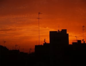 Silhouette photo of buildings during dusk thumbnail
