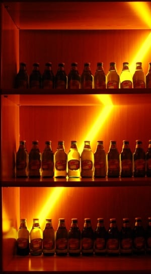 bottle lot on brown shelf thumbnail