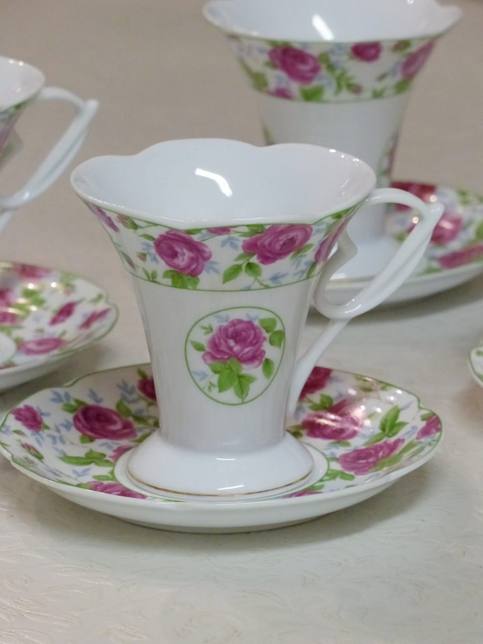 green white and purple scallop ceramic teacup with saucer preview