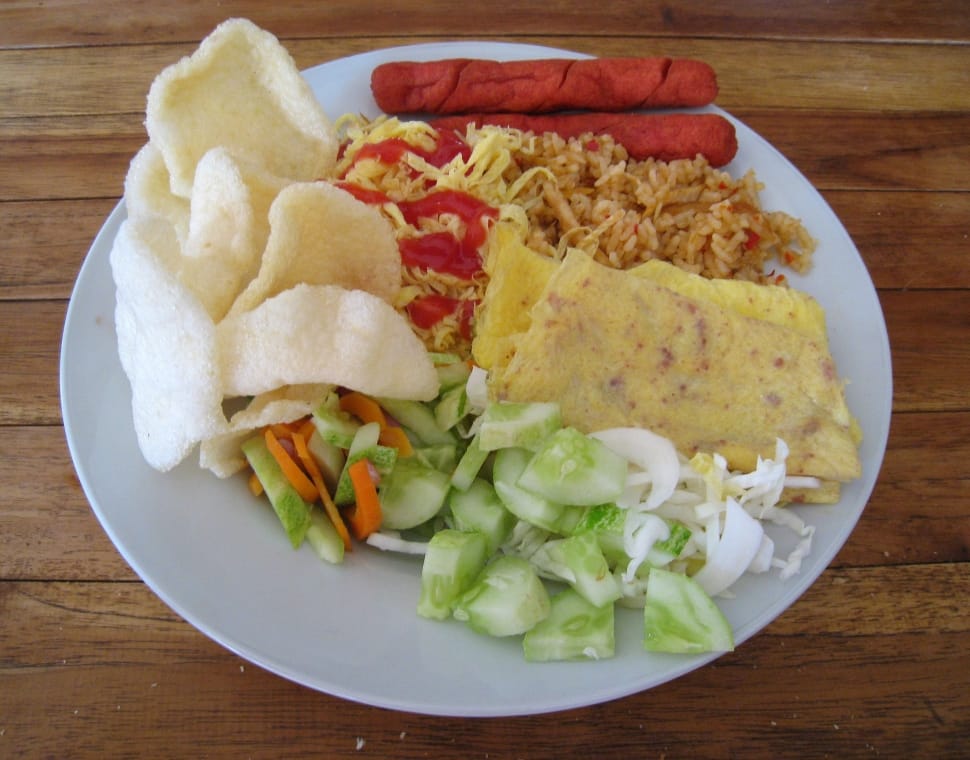 cutted vegetables, fried rice, hotdogs, omelette egg and fried crackers preview