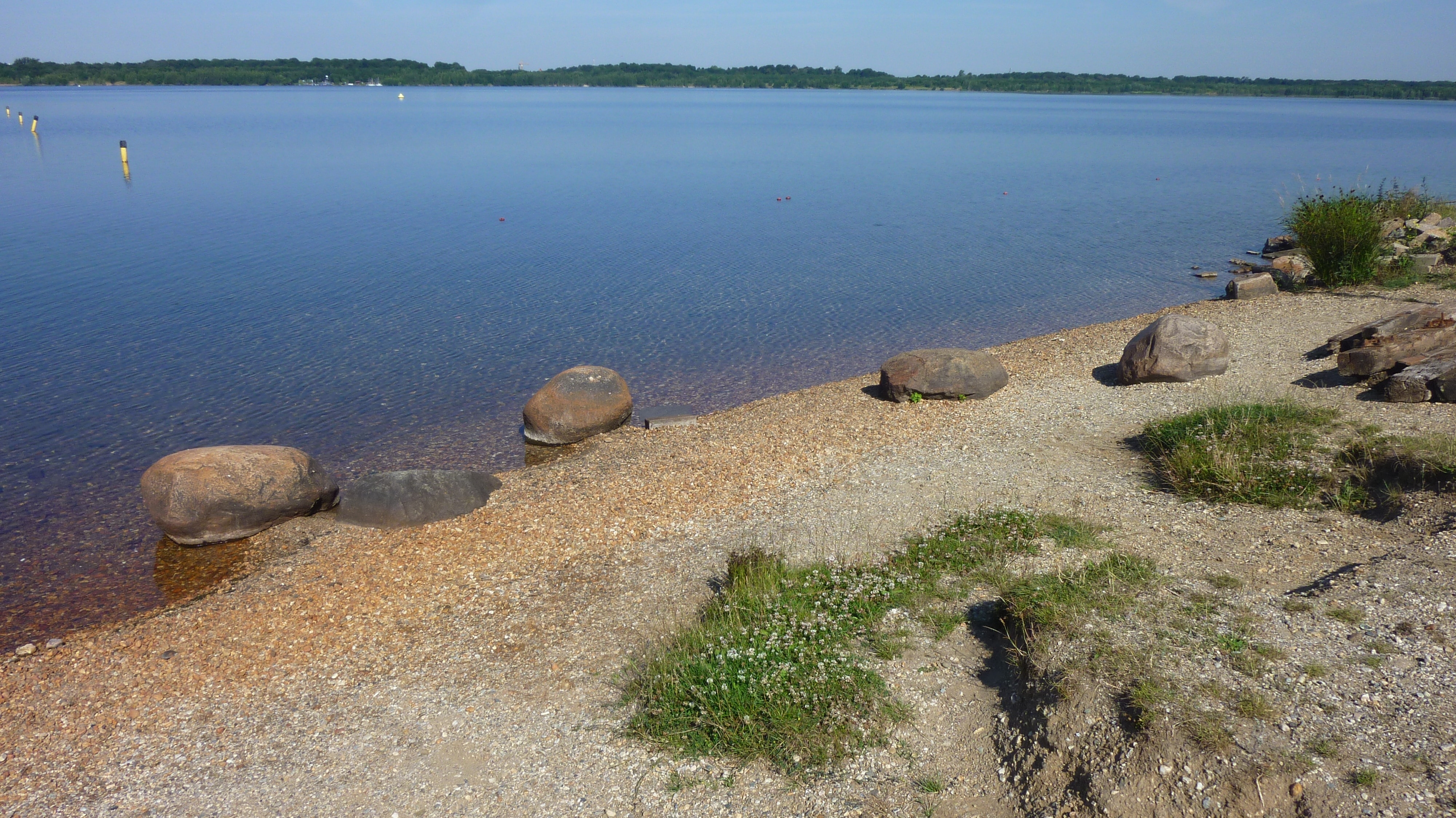 brown rocks near body of water