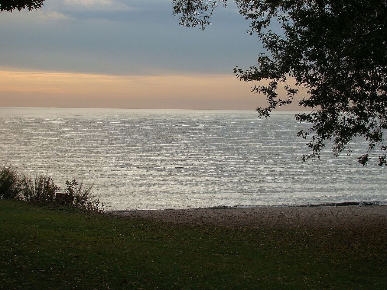 grey sand and sea