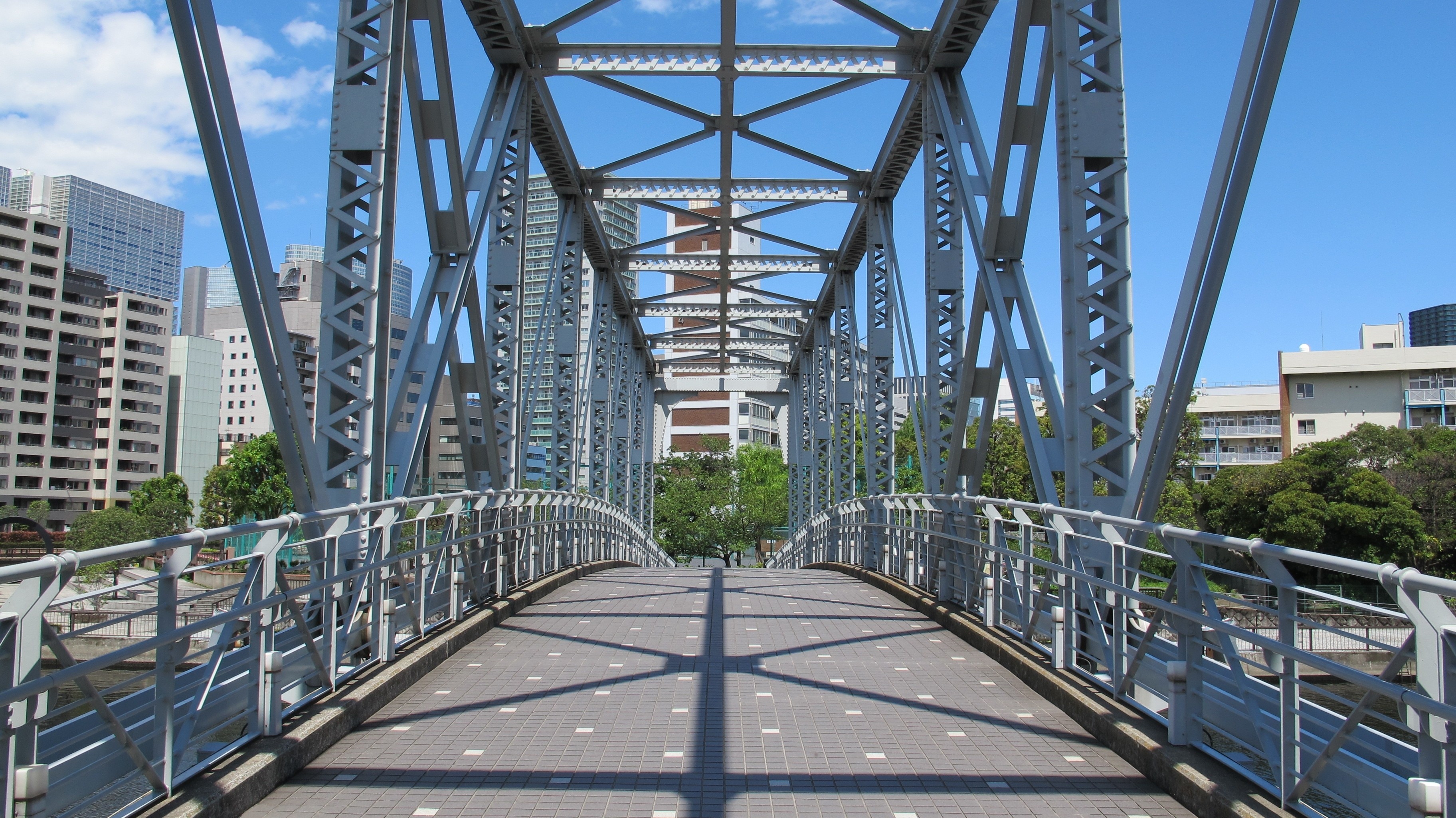 photo grey metal bridge during daytime