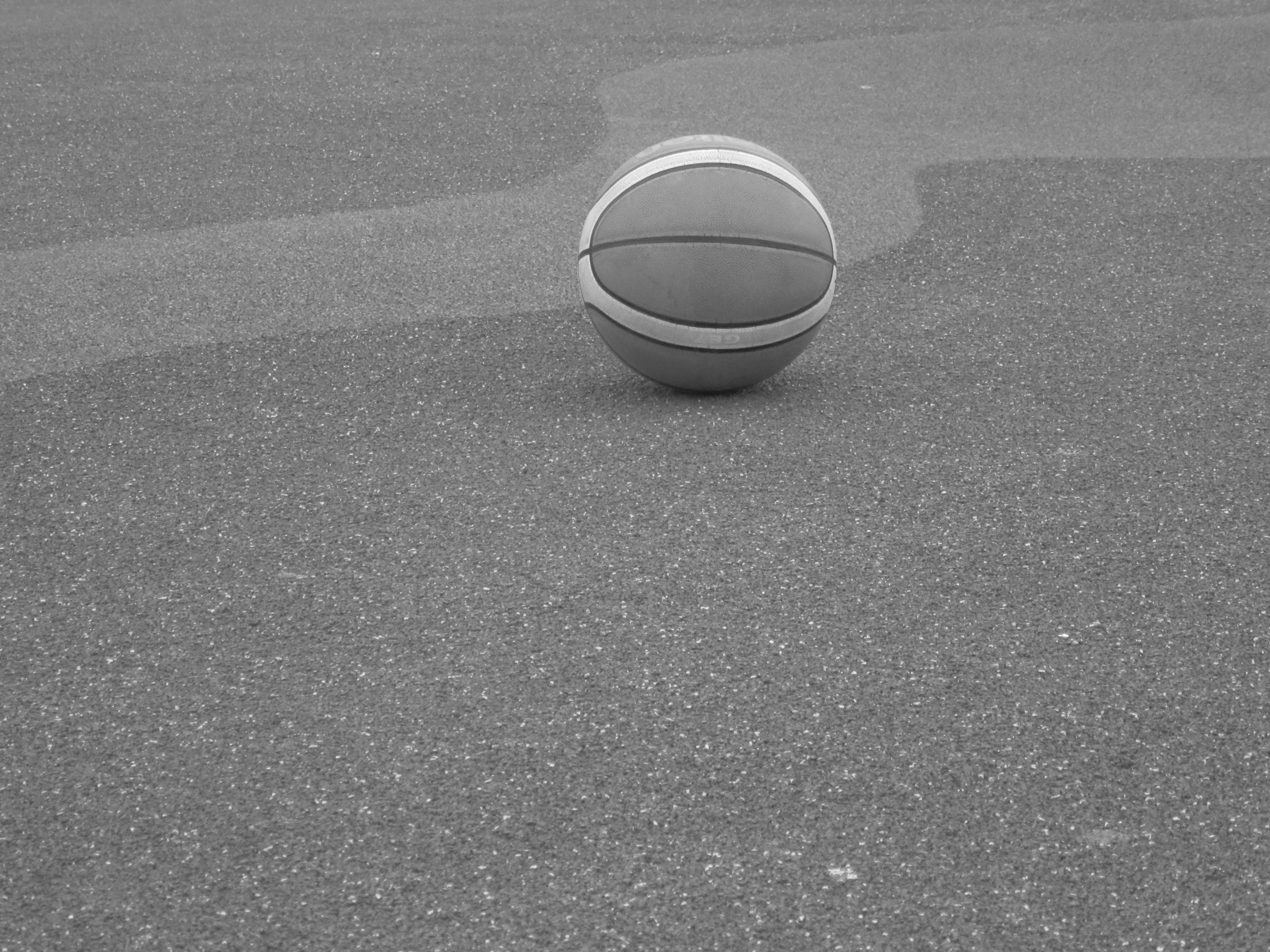 basketball on gray surface