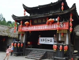 black wooden Chinese structure at daytime thumbnail