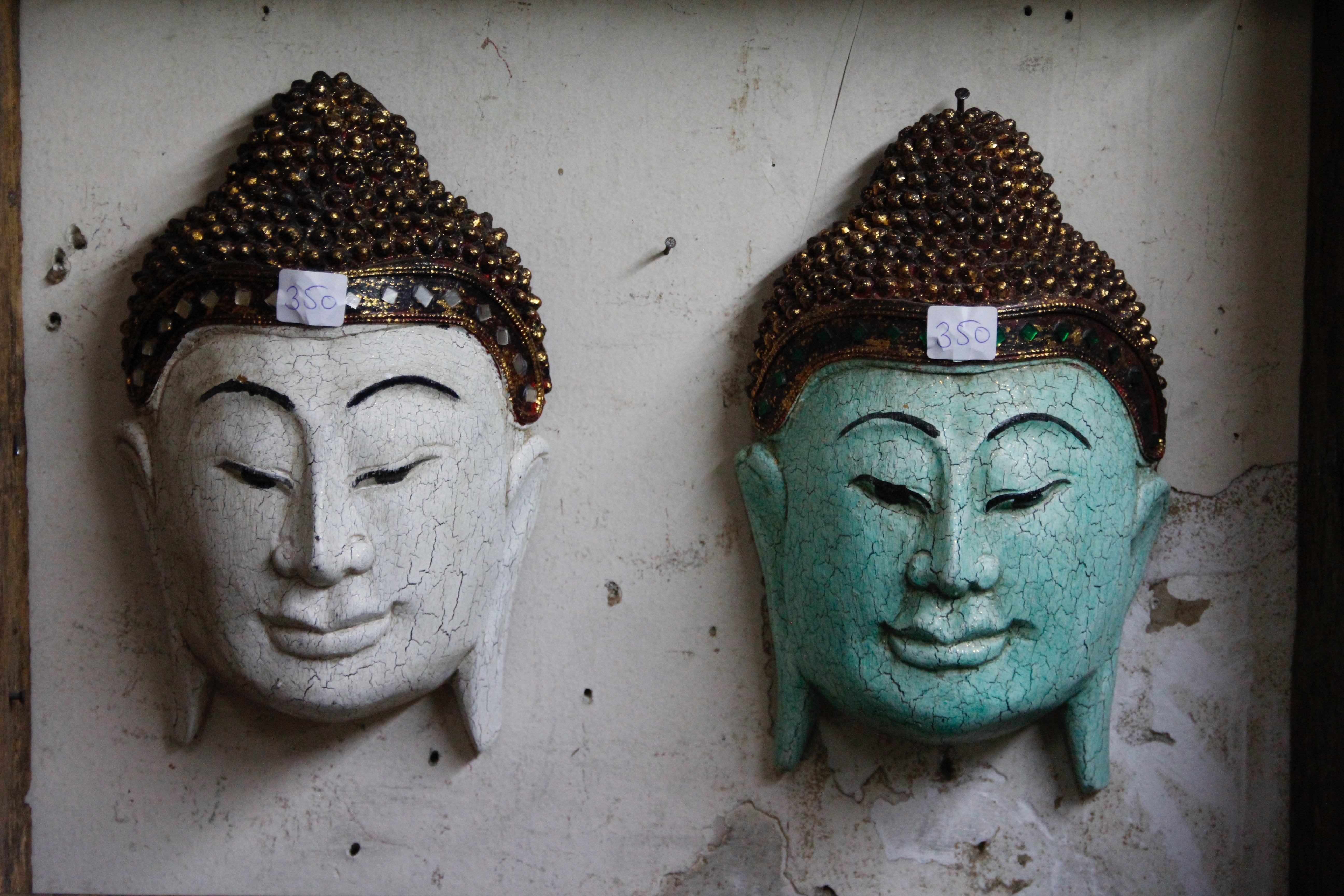 2 buddha head wall decors